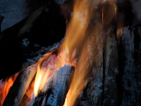 cracking fire in fireplace detail photo