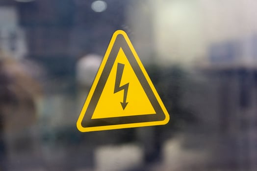 Sign danger high voltage. Sign dangerously high voltage electricity photo