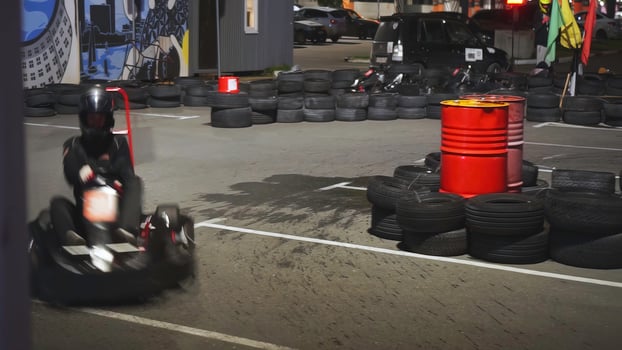The Thrilling and Exciting Scene of Indoor GoKart Racing Offers an Unforgettable Experience. Media photo