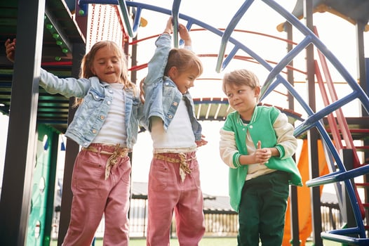 Front view. Kids are, having, fun on the playground photo