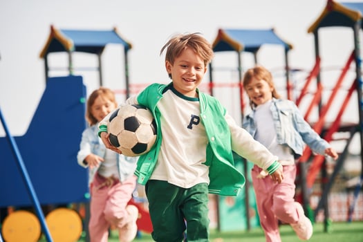 Cheerful, kids are, having fun on the playground photo
