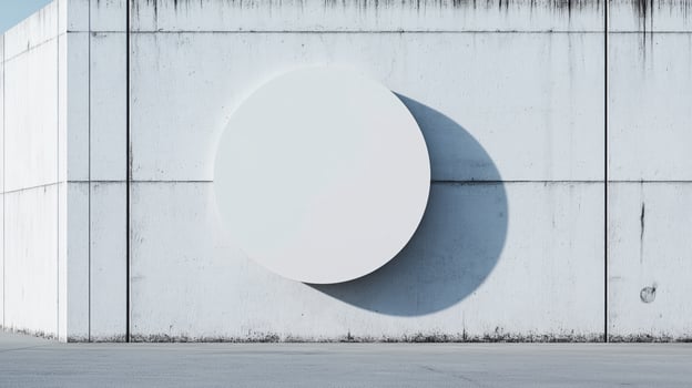 Minimalist Circular Structure on Concrete Wall with Shadows photo