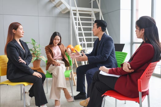 Asian businesspeople team discussing ideas in modern office, Teamwork and brainstorming concepts with businesspeople in office meeting photo