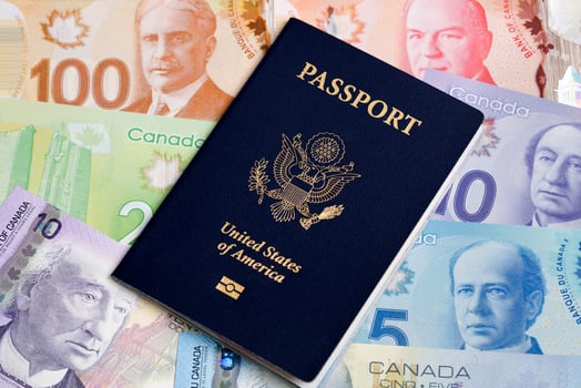 American passport on a Canadian money photo