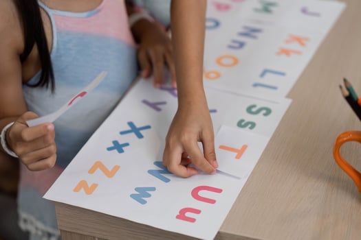 Back to School and Learning Fun. Children engaging in educational activities with their grandmother. photo