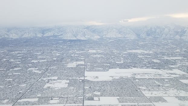 Flying into Salt Lake City in Winter, Snowy View from the Plane Window photo