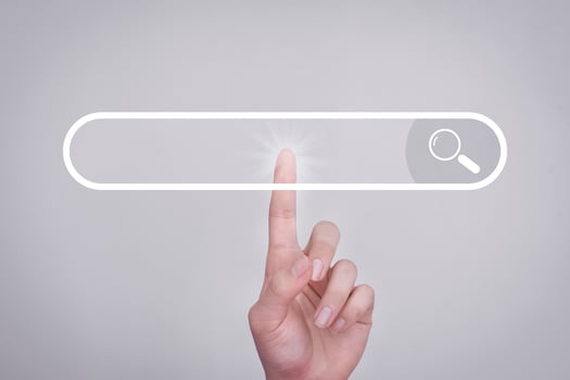 Search button on virtual screen pressed with finger on white background and shows the internet connection, international and global social media. Search concepts searched on the internet. photo