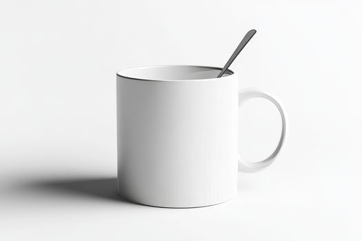 A white mug with a spoon in it photo