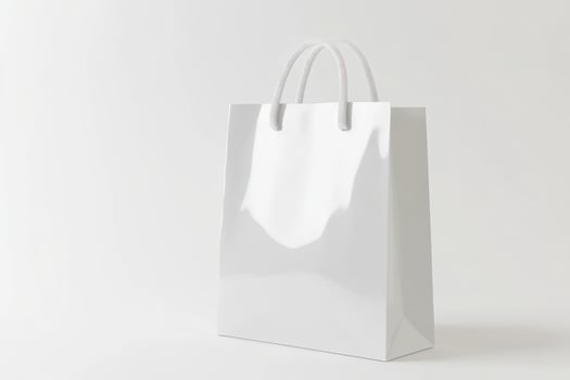 White paper bag on a plain background photo