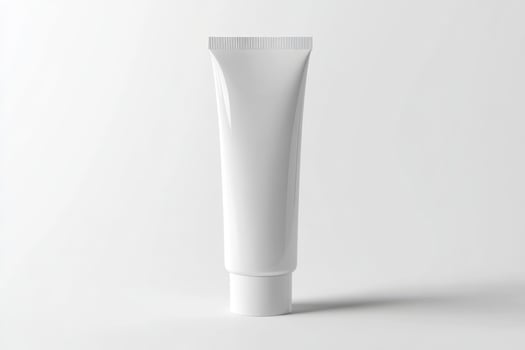 A tube of cream on a white background photo