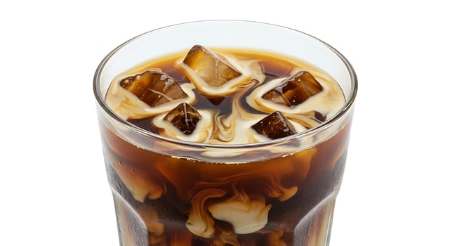 Iced Coffee with Cream Swirling Cold Refreshment Beverage in Glass photo