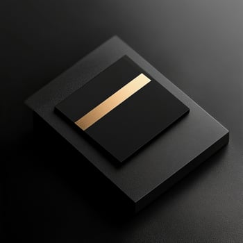 A black box with gold stripes on it photo