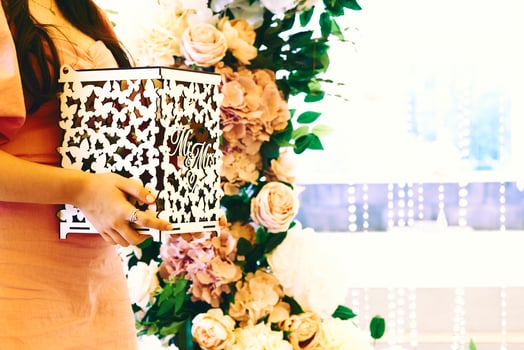 Witness at a wedding with a box for money and gifts photo