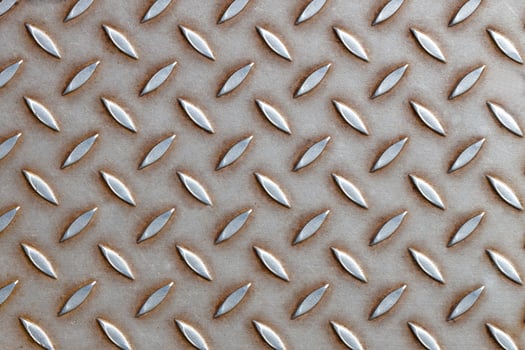 Industrial Metal Tread Plate with Raised Pattern photo