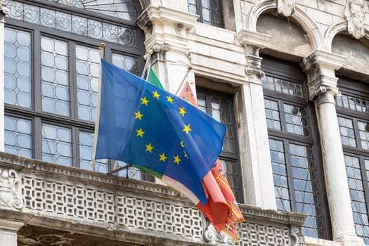 Venice, Italy - April 17 2025 European Union, Italian and Venetian flags waving on historic city building photo