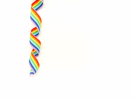 Top view of the rainbow cloth ribbon on a white background. photo