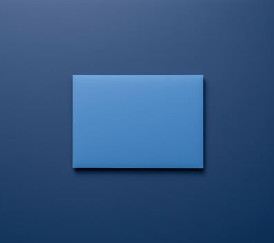 Stylish Blank Blue Envelope on a Dark Blue Background photo