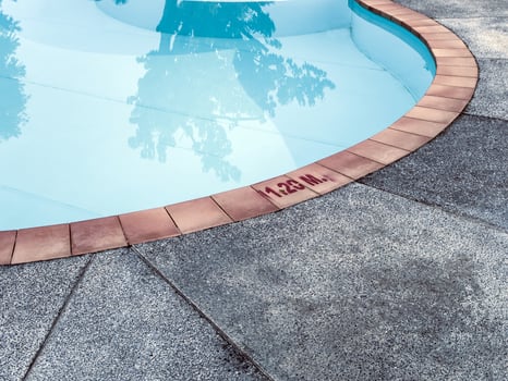 Deep level number show on border of pool photo