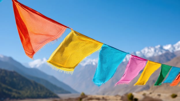 Colorful prayer flags fluttering in the wind in the Himalayas photo