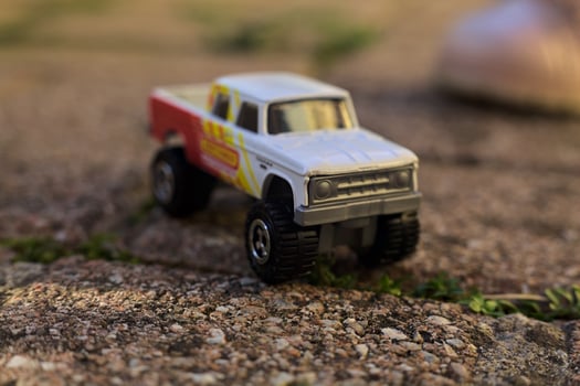 Toy car on the ground photo