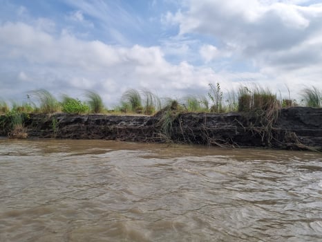Erosion on the Riverbank A Landscape of Nature's Power photo