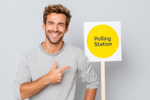 Engaging young man smiling and pointing at polling station sign promoting civic participation and encouraging voting awareness in community engagement concept photo