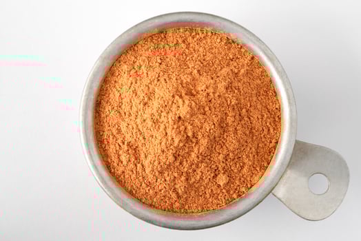 Goji Berry Powder in a Vintage Measuring Cup photo