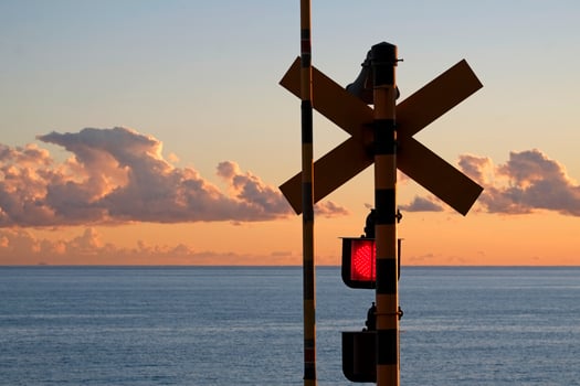 Famous railway crossing in Kamakura, Japan, at sunset photo