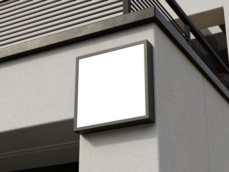 Clean and simple square logo sign mockup against a clear blue sky, ideal for logo placement. photo
