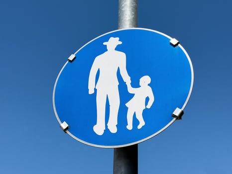 Pedestrian walkway sign symbolizing adult and child photo
