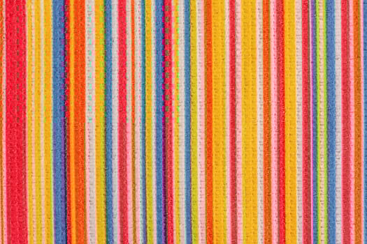 Microfiber cloth as a background macro photo. Microfiber fabric in colored stripes. photo