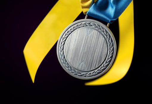Silver Medal with Dual-Colored Ribbon Symbol of Achievement photo