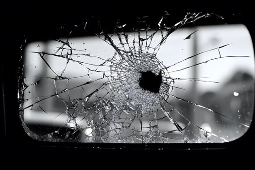 Cracked Windshield Glass Texture with Focus on Impact Center for Design and Safety Themes photo
