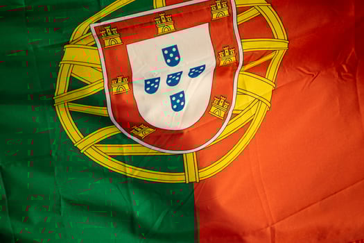 close view of the green and red portuguese flag detail of the flag of portugal photo