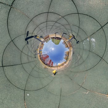 A skateboarder is riding in a circular tunnel photo