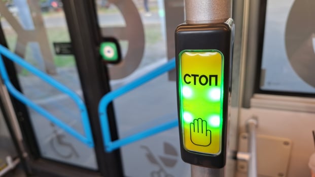 Moscow, Russia - April 26, 2025.Bus stop button in russian urban public transport photo