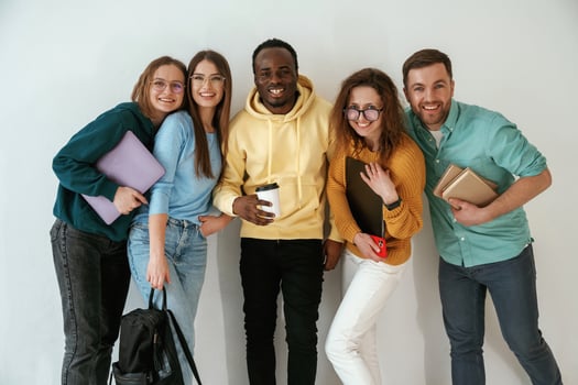 Positive,, friends. Group, of young people are standing against white background photo