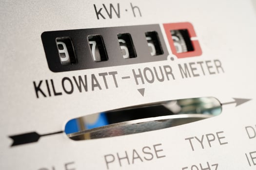 Electric measuring power meter for energy cost at home and office. photo