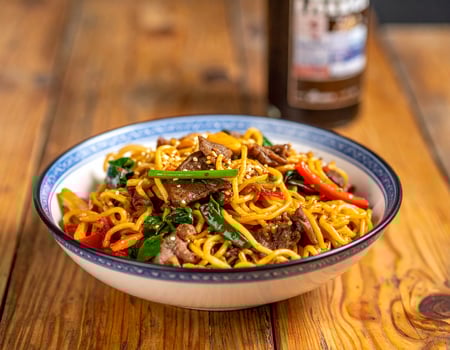 Traditional Chinese Lo Mein Noodles with Beef and Vegetables photo