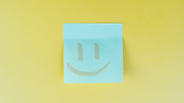 Blue Sticky Note With Smiley Face photo