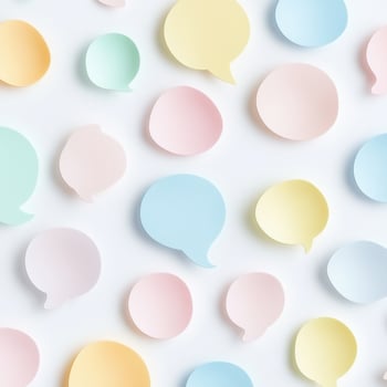 Light toned Talk Bubbles on White Sheet photo