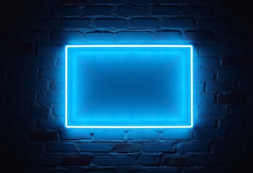 Neon square frame on brick wall photo