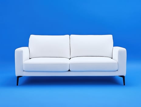 White sofa against a vibrant blue background in modern style photo