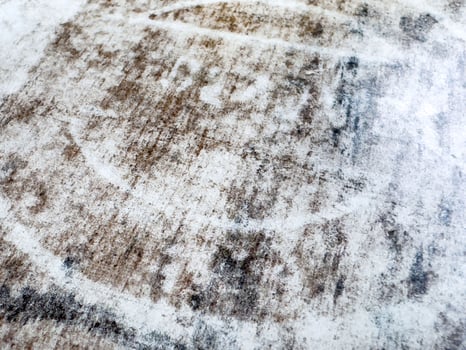 Abstract textured surface with brown and white patterns photo