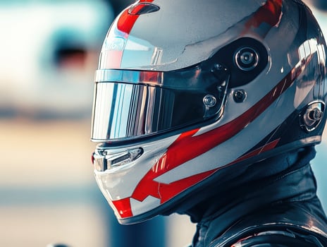 Racer preparing for competition at a motorsport track photo