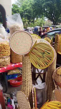 a market with baskets and other items for sale photo