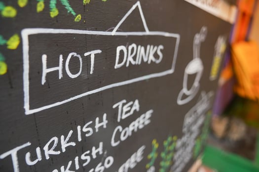 Hot drinks menu showcasing Turkish tea and coffee options photo