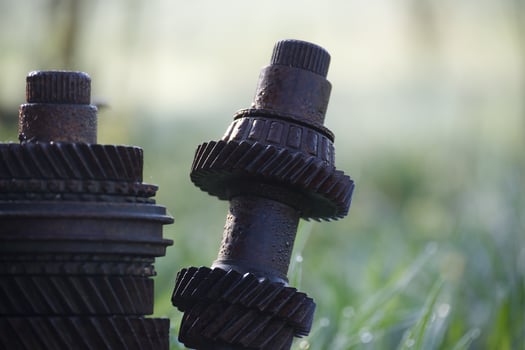 Rusty gears and shafts creating an interesting outdoor sculpture photo