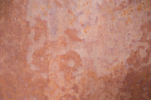Detailed texture of oxidized rusty metal sheet photo