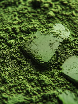 Green background with green powder on it matcha texture. photo